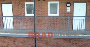 Bradfabs made this balcony access structure, made using mild steel, with timber decking installed on some apartments in Leeds, West Yorkshire