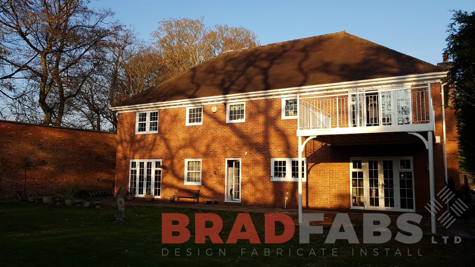 Large custom made balcony in steel and powder coated white by Bradfabs in West Yorkshire UK