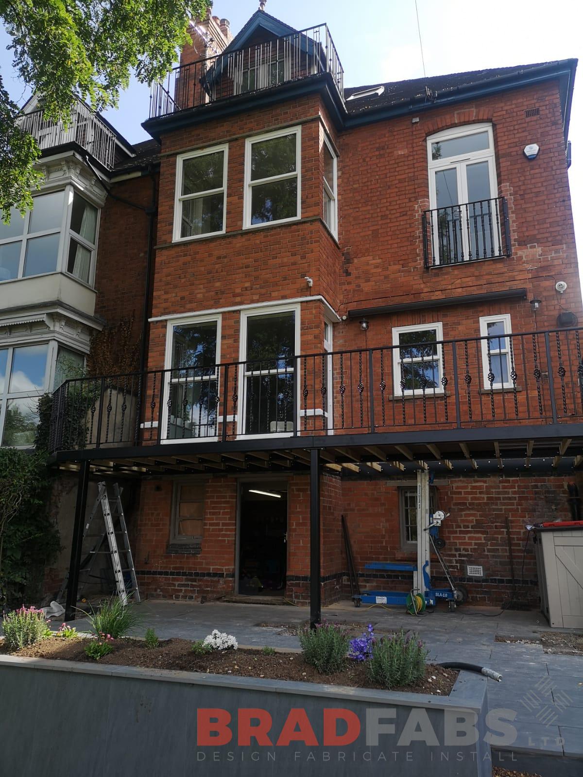 Large mild steel, galvanised and powder coated balcony with vertical decorative balustrade by Bradfabs 