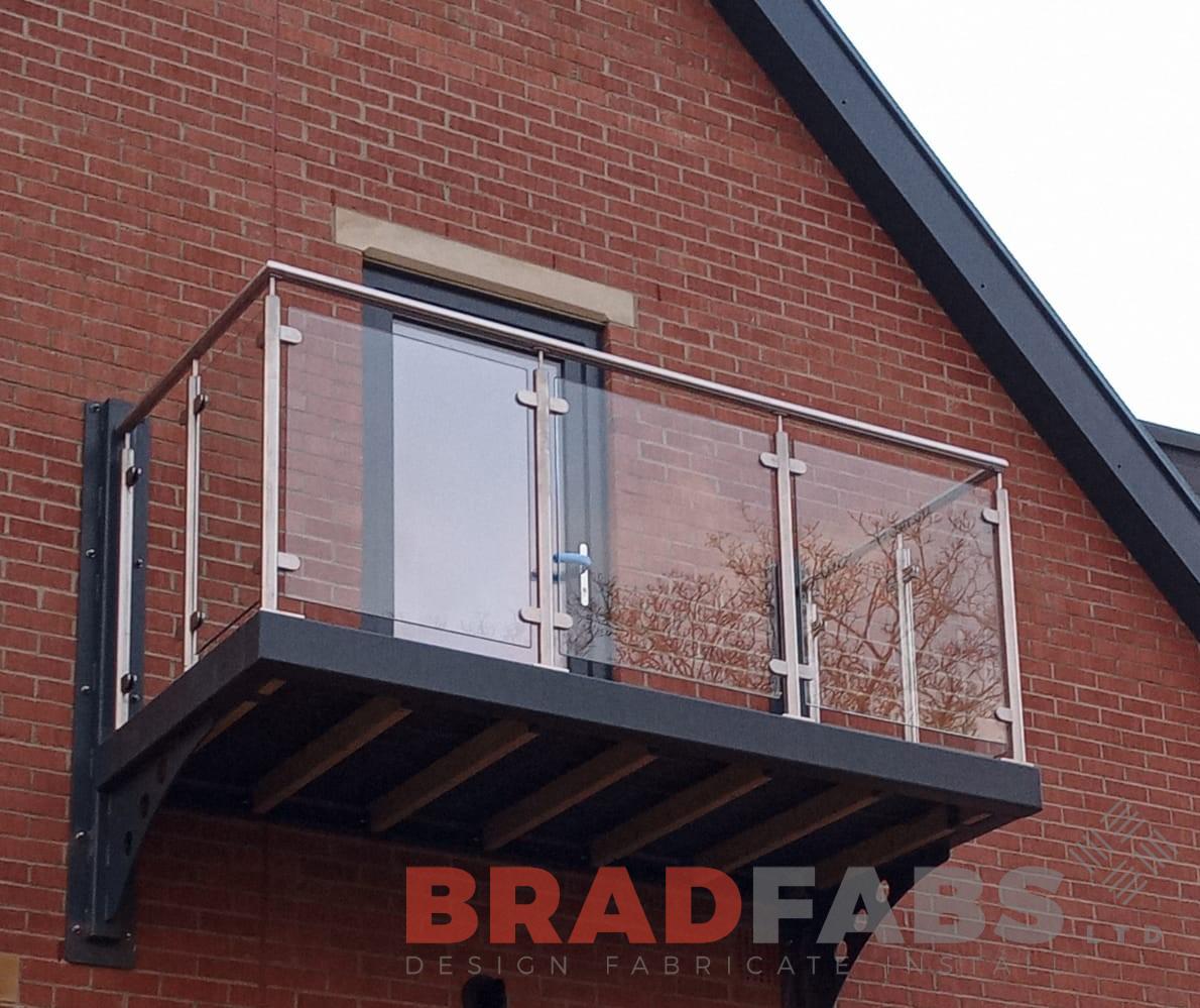 Bradfabs, cantilevered balcony, bespoke balcony, metal balcony, stainless steel and glass balustrade