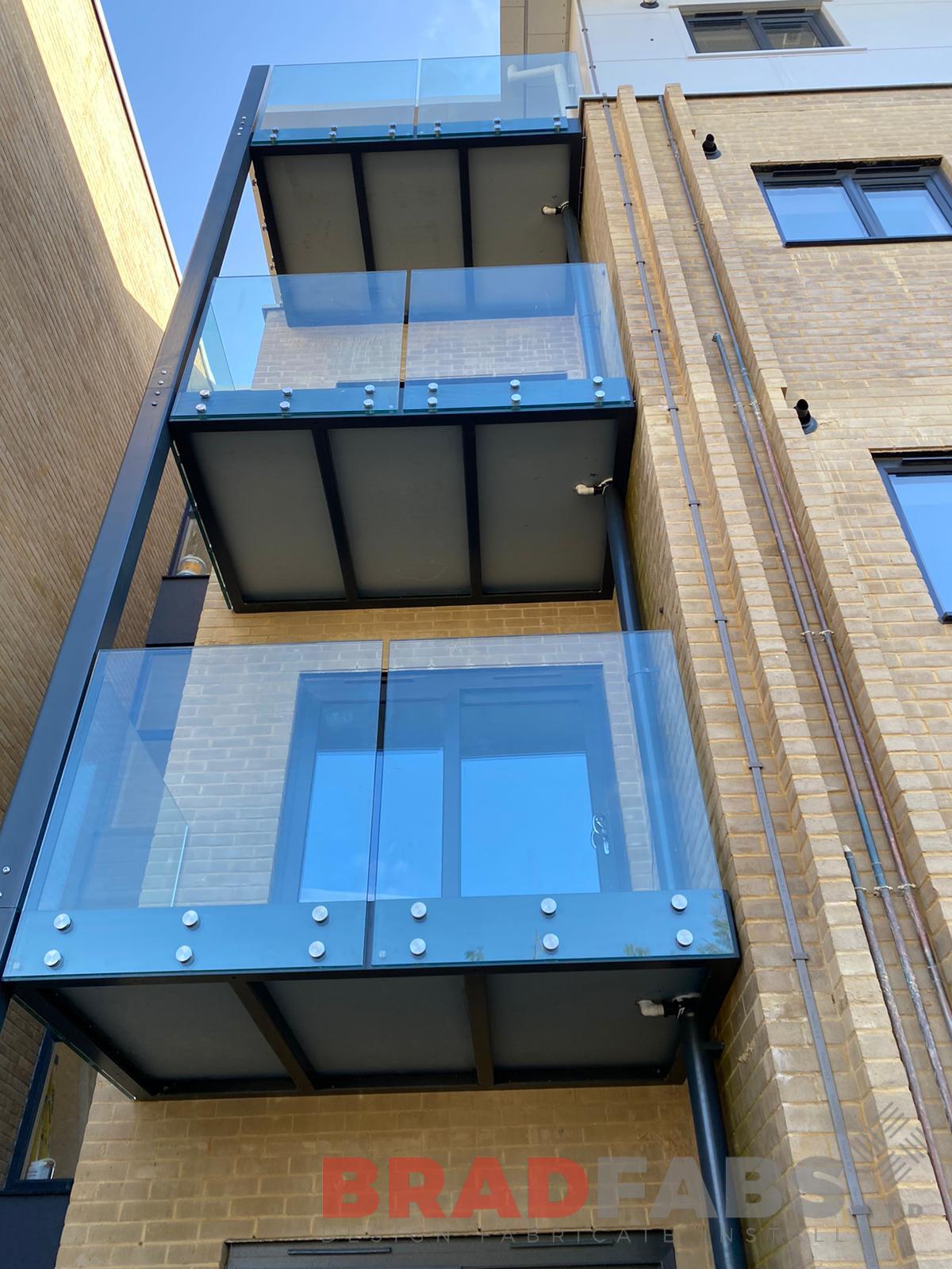 Bradfabs, stacked balconies, bespoke balconies, bolt on infinity glass, composite decked flooring 