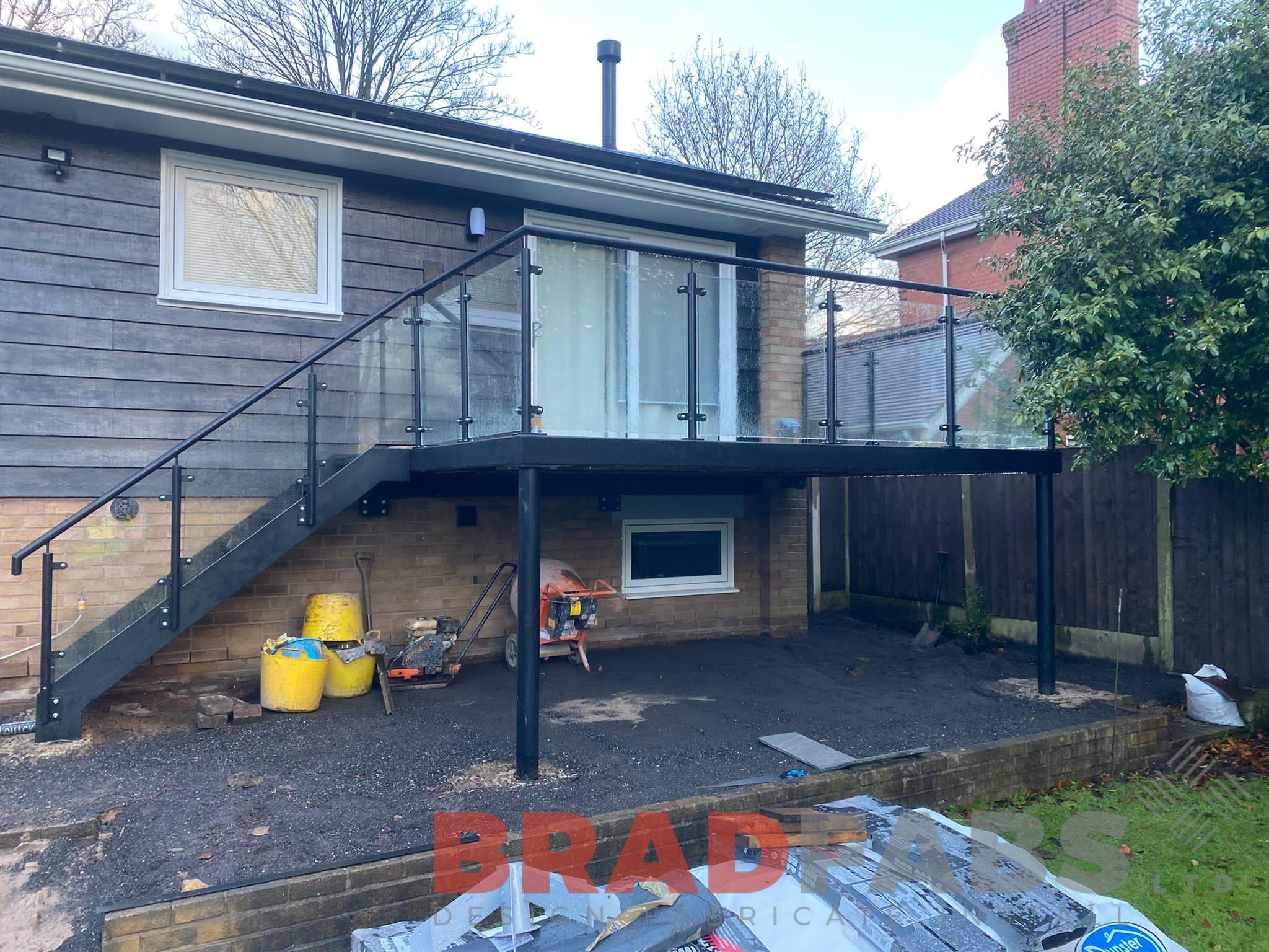 Balcony, Bradfabs, balcony with staircase, mild steel and glass balustrade, straight staircase, durbar treads, composite decking 