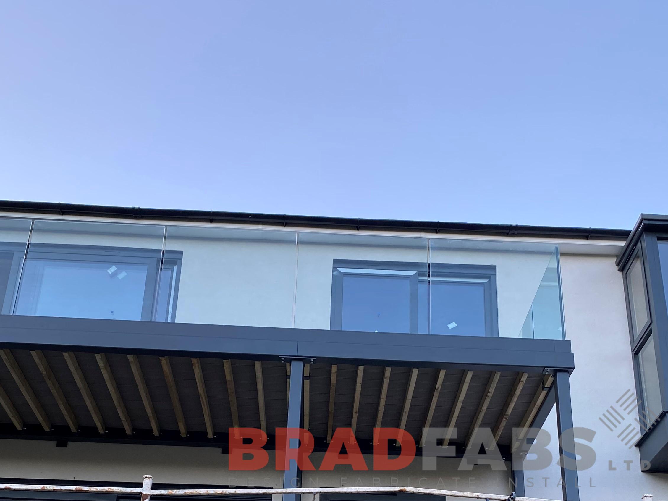 Bradfabs, balcony, steel balcony, bespoke balcony, channel system infinity glass, composite decking 
