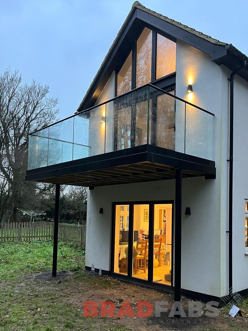 Steel balcony with glass balustrade by bradfabs 