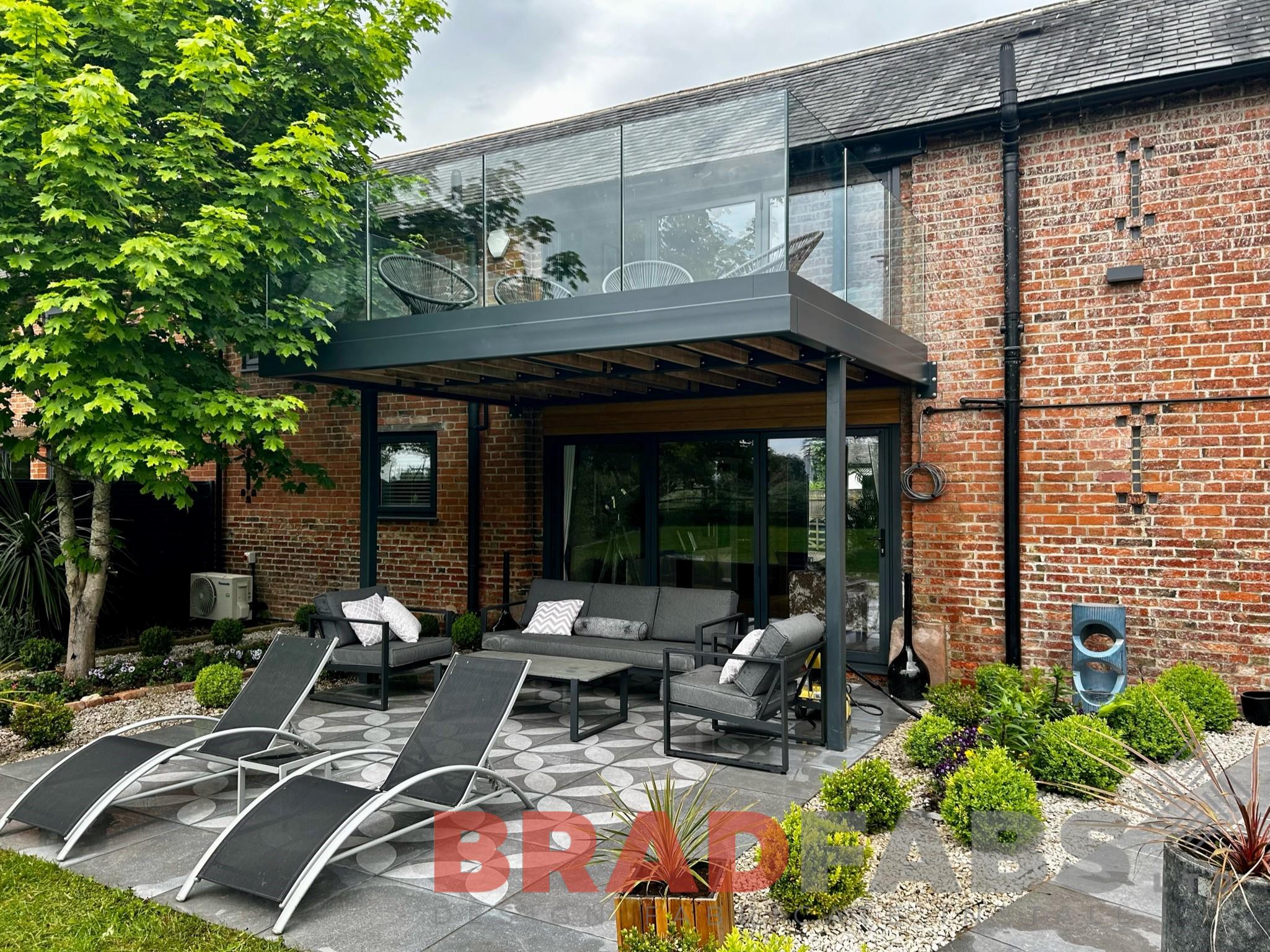 Steel balcony with glass balustrade by bradfabs 