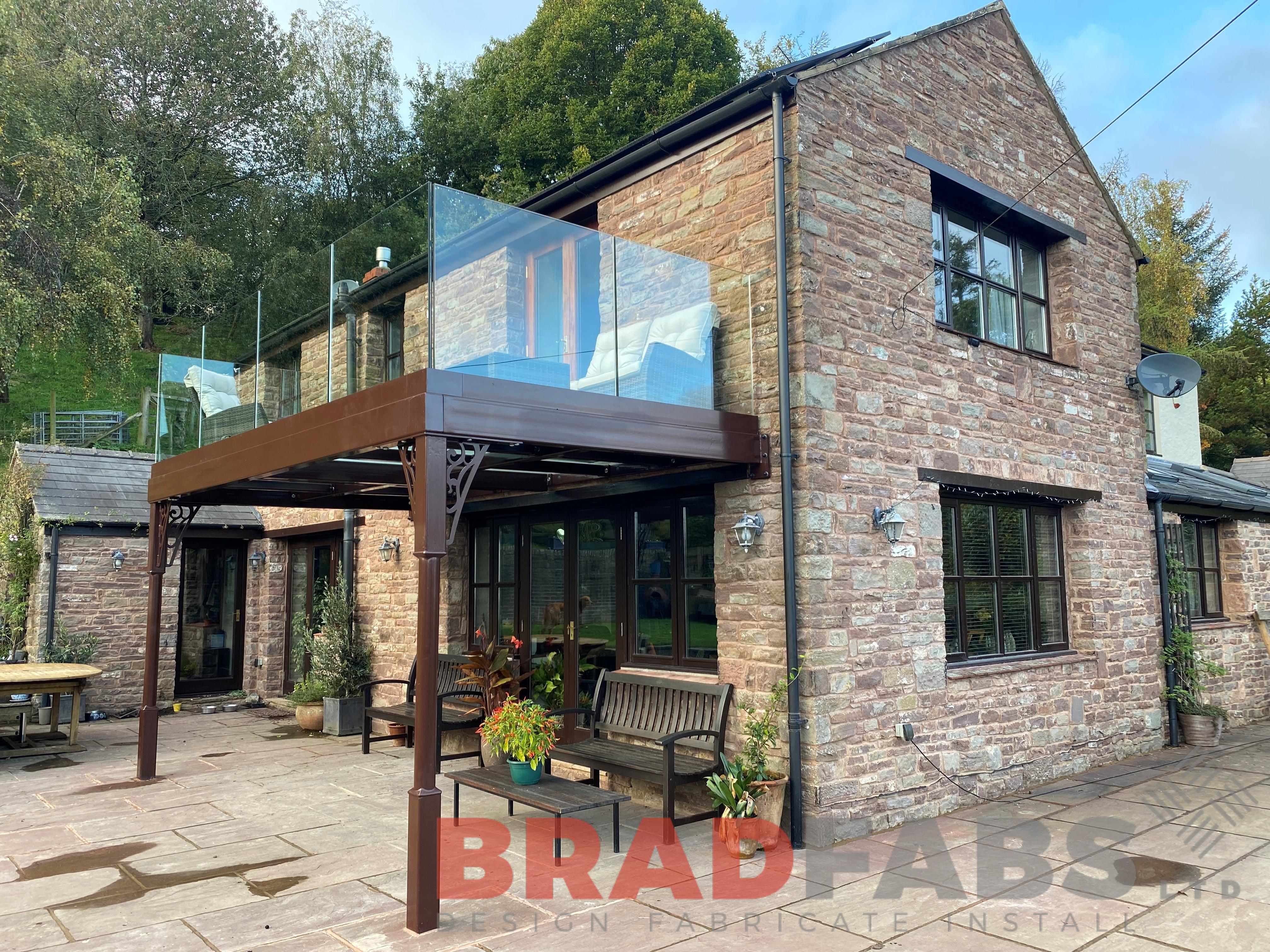 Bradfabs balcony, glass balustrade, steel structure with composite decking 