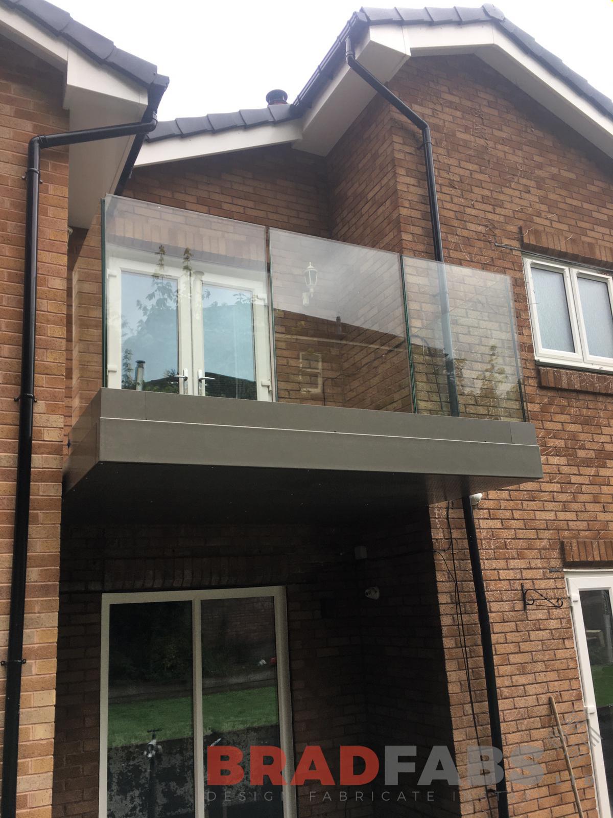 Balcony, glass balustrade balcony with perforated soffit,
