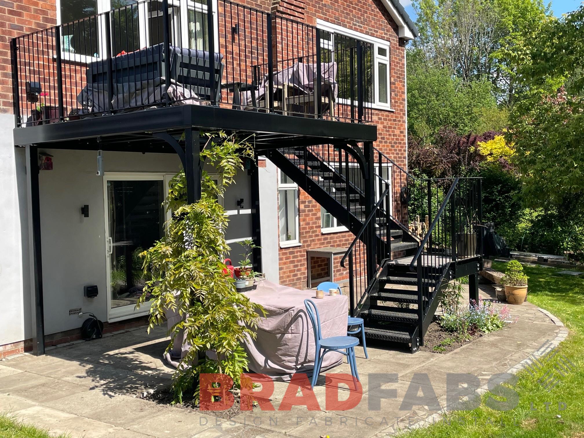 Free standing metal balcony with kite winder staircase