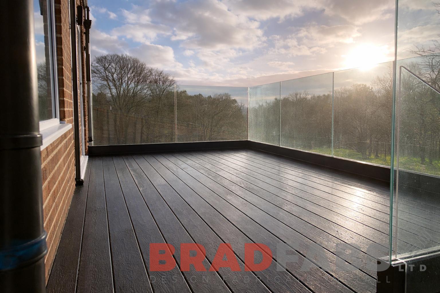 Bespoke Steel Balcony and staircase with Glass Balustrades | Composite Decking UK