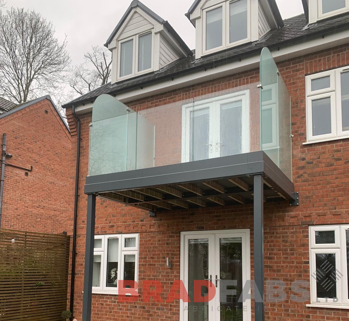 Steel frame balcony with glass balustrade in Ilkeston