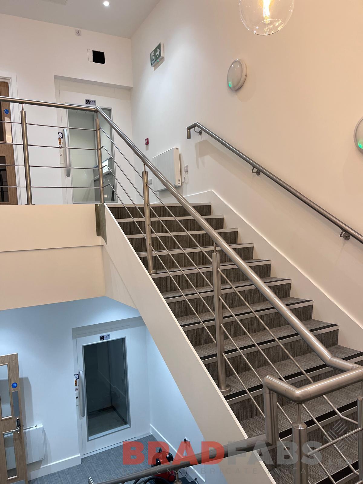Stainless steel horizontal infill bar balustrade install in an office in South Ascot 