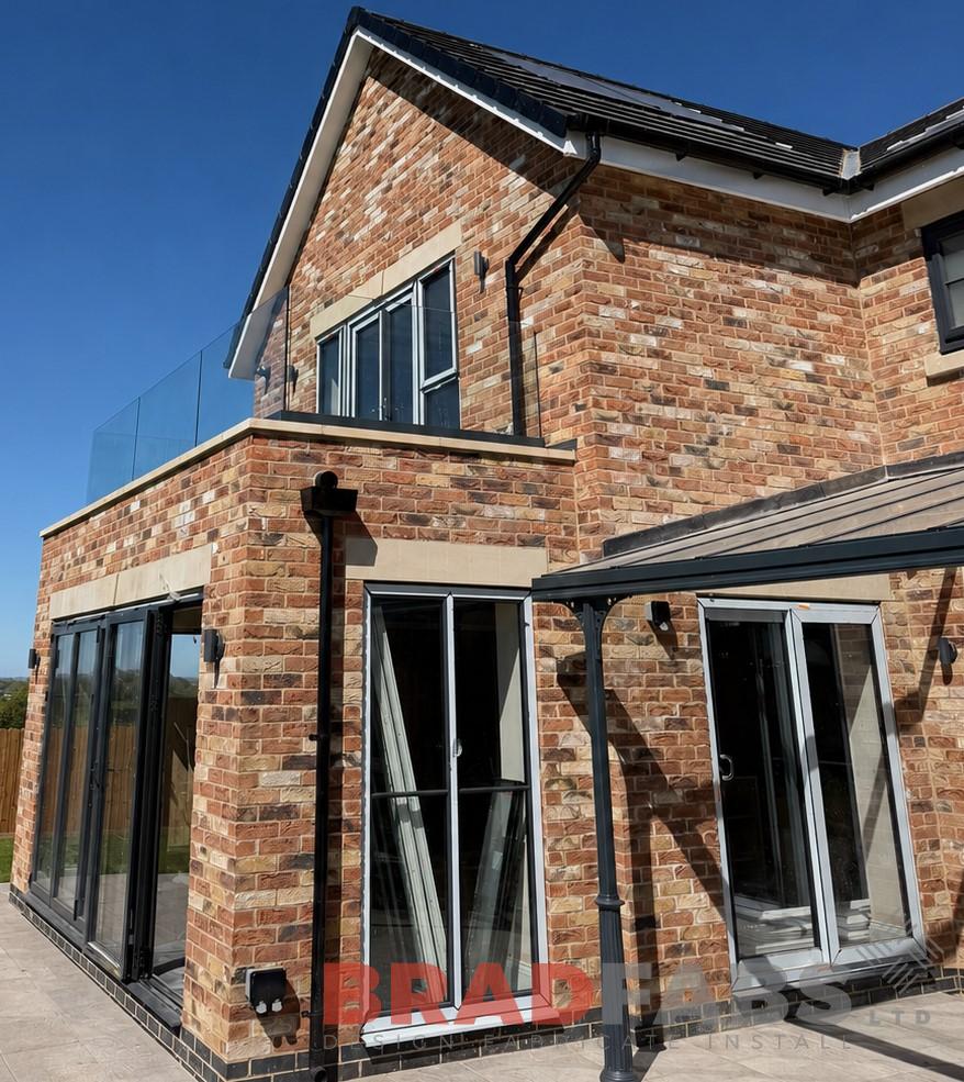 Infinity glass balustrade with base fixed channel system and 21.5mm toughened laminated glass, installed in Horby