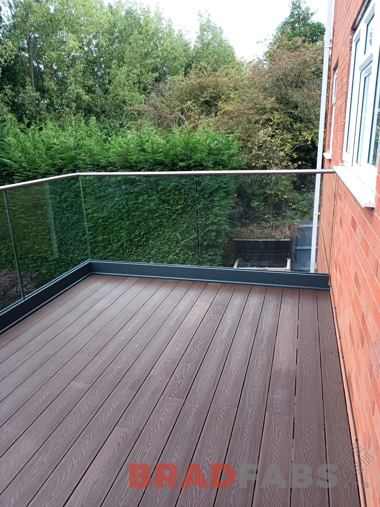 Channel system infinity glass with stainless steel top rail on one of our bespoke balconies 