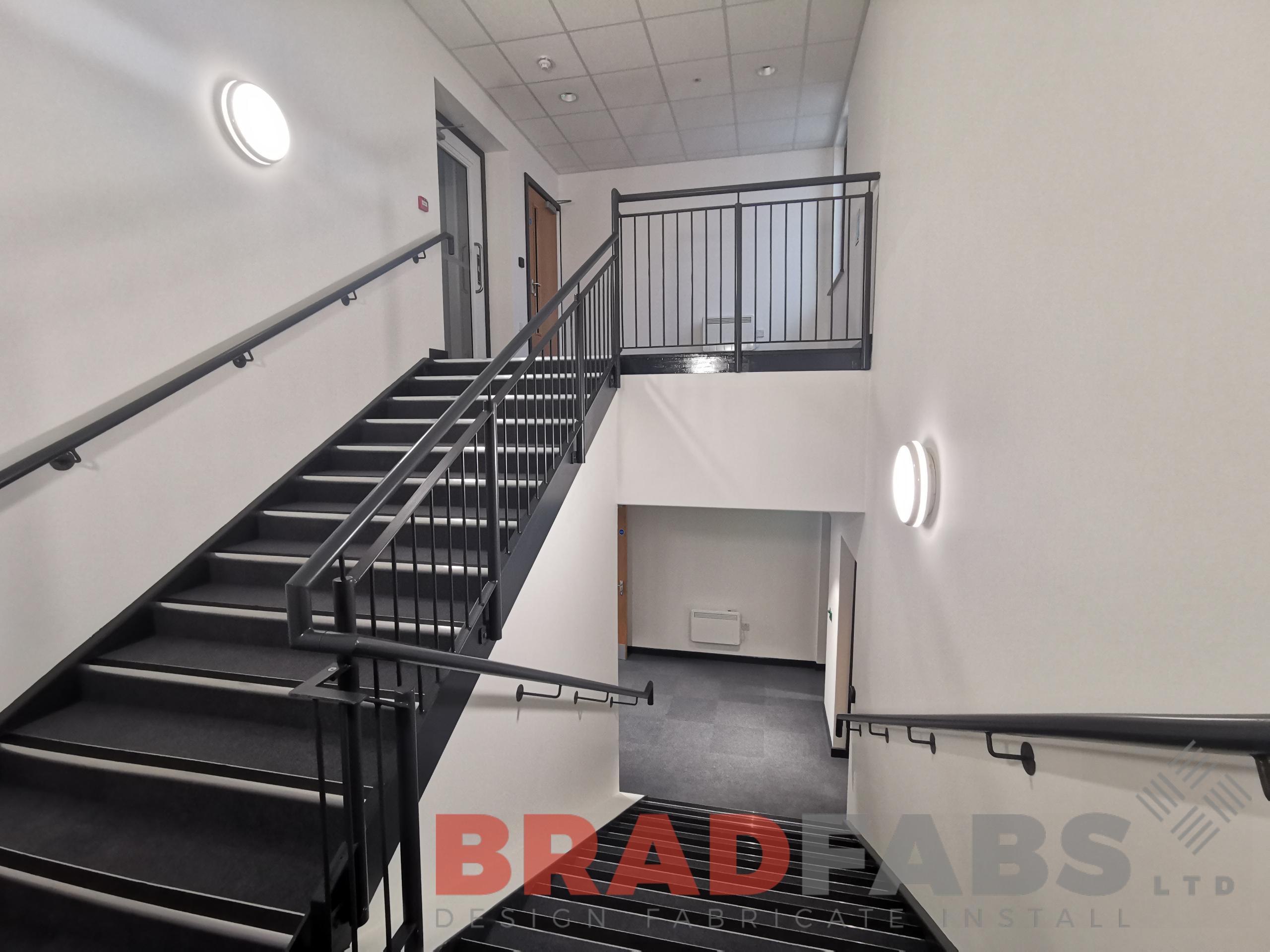 Internal two flight school staircase with balustrade to stair and landing, bespoke designed, supplied and installed by Bradfabs Ltd 