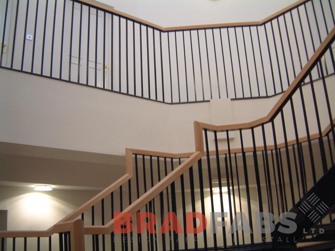 Vertical bar balustrade on bespoke helix staircase by Bradfabs