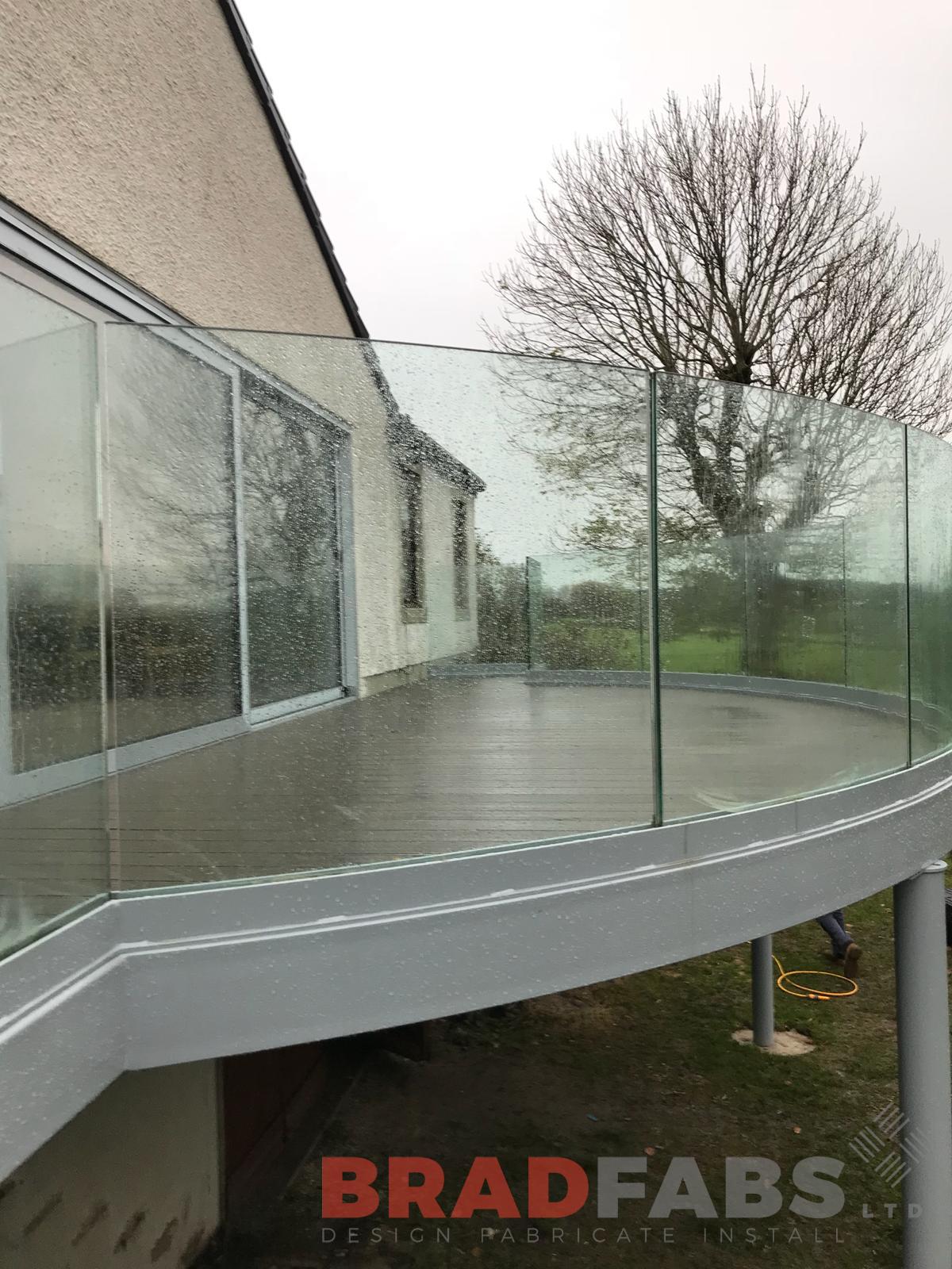 Curved Infinity glass channel system balustrade