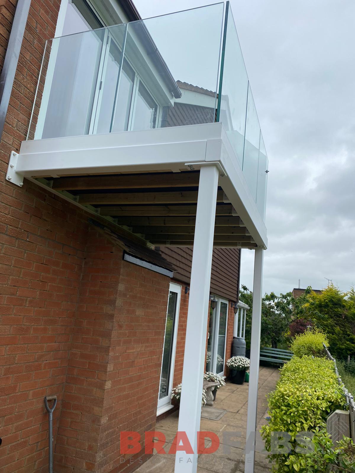 channel system infinity glass balustrade on a bespoke balcony by bradfabs 