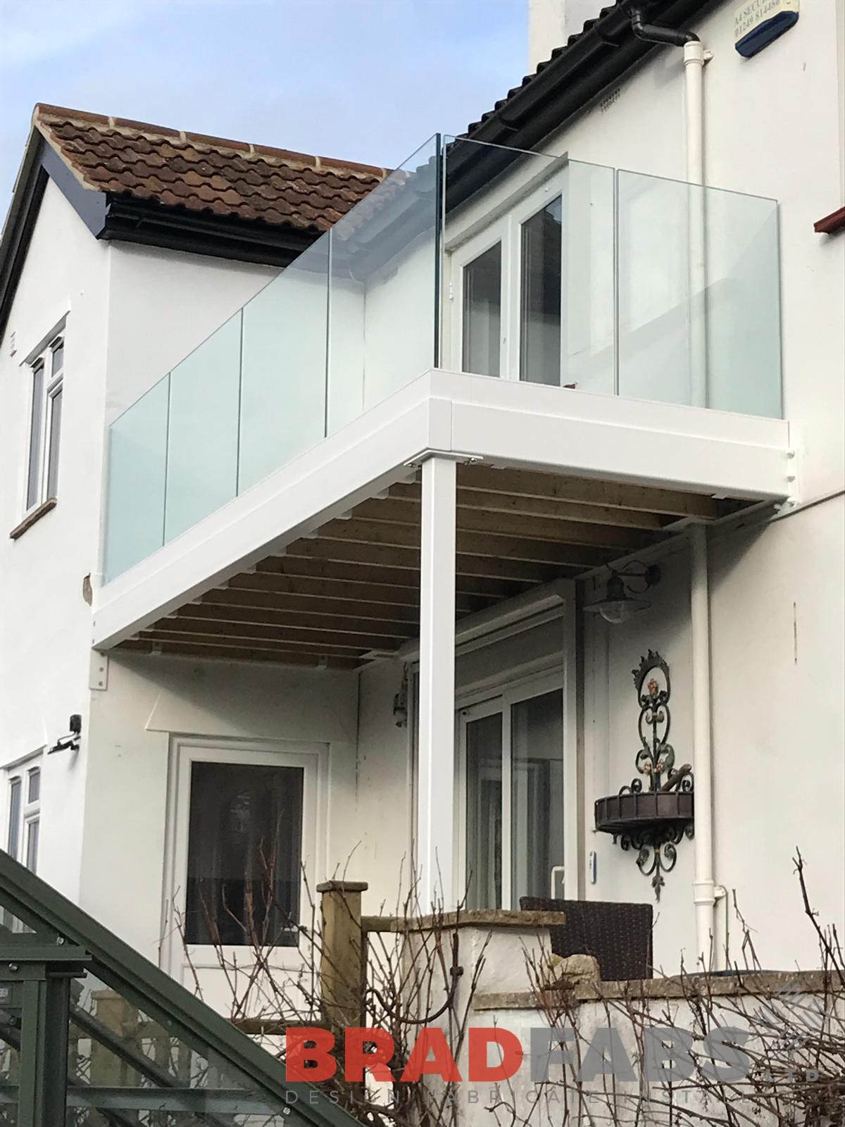 Bespoke balcony with infinity glass channel system balustrade by Bradfabs 