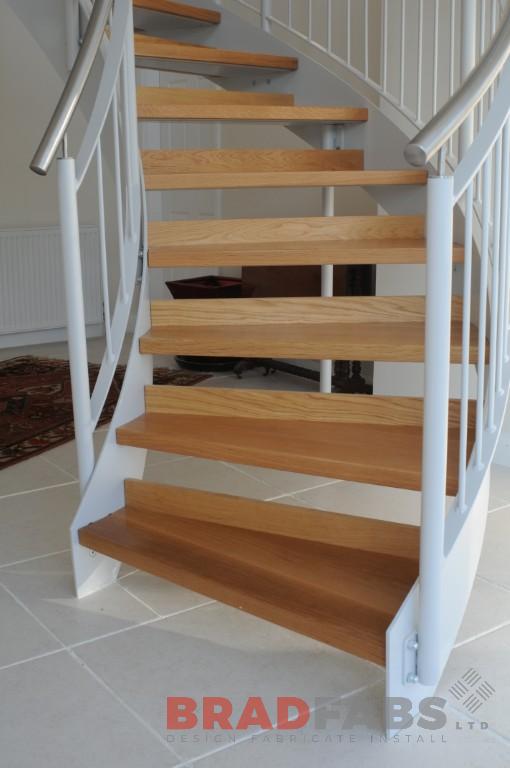 timber clad and stainless steel helix stairs