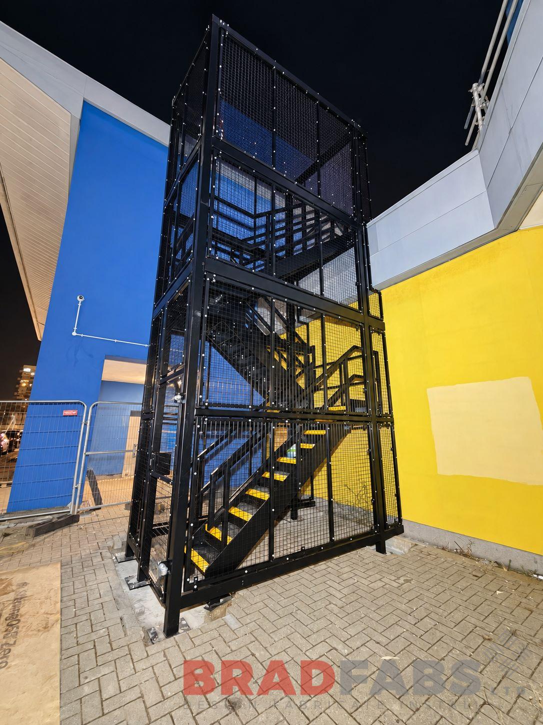 Fire escape with yellow nosings installed in Tower Hamlets