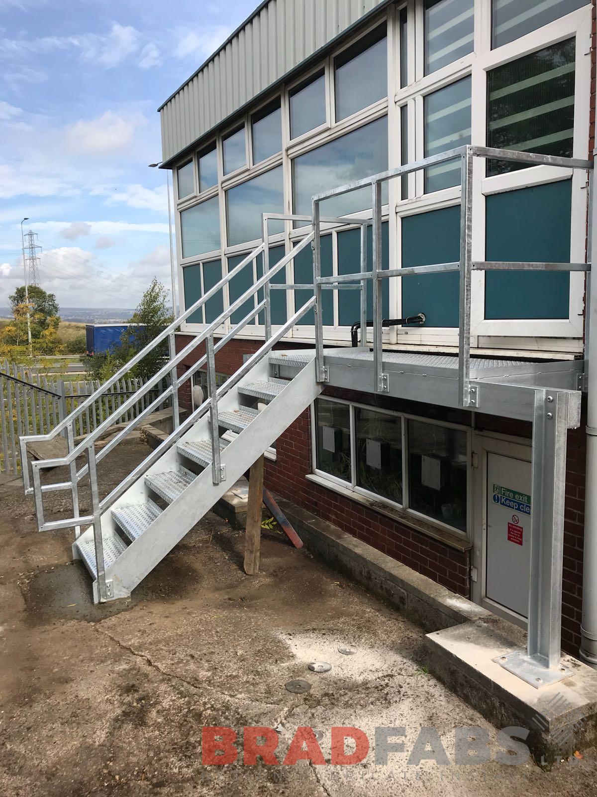 Small metal commercial fire escape designed fabricated and installed by Bradfabs