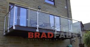 cantilevered balcony with stainless steel and glass balustrade 