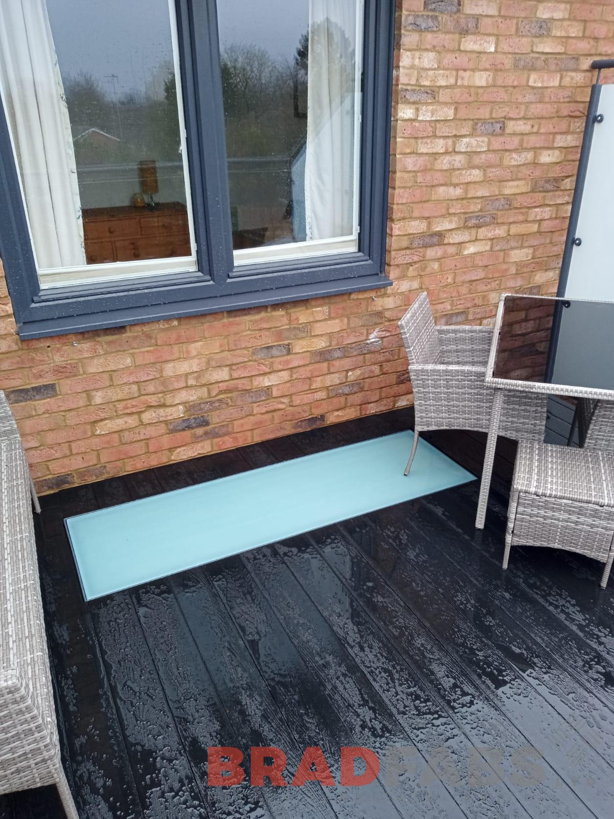 Balcony with lightwell in composite decked flooring, bespoke by bradfabs 