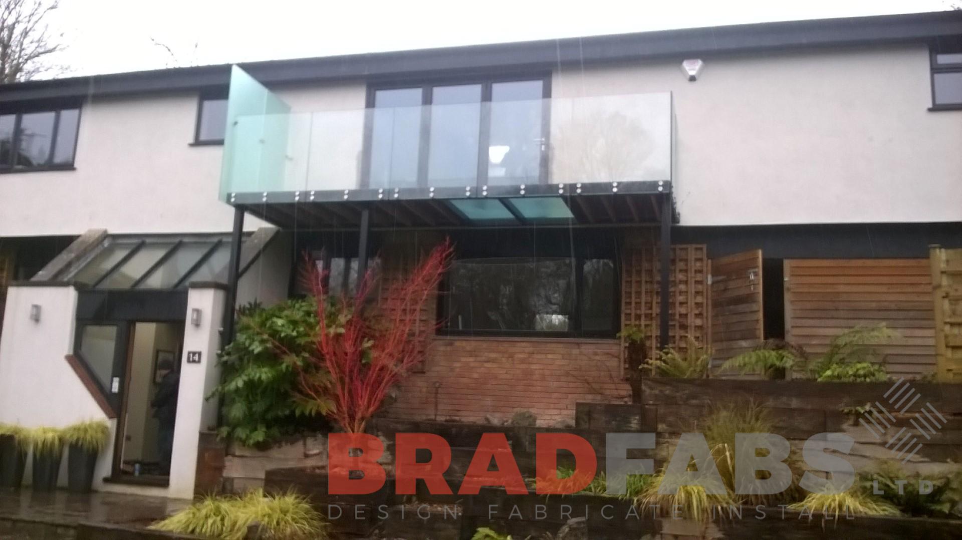 two glass panels on a bespoke mild steel balcony by bradfabs 