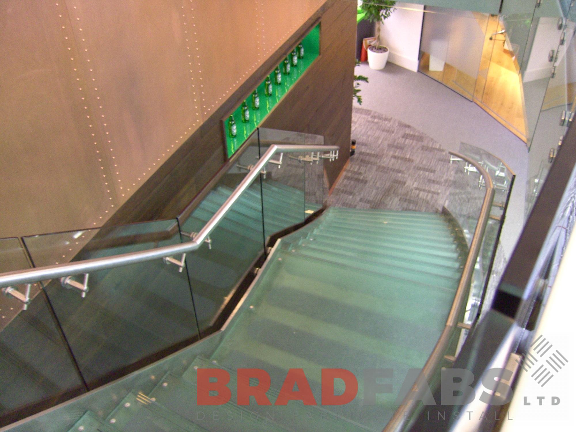 Glass balustrade with glass treads by Bradfabs