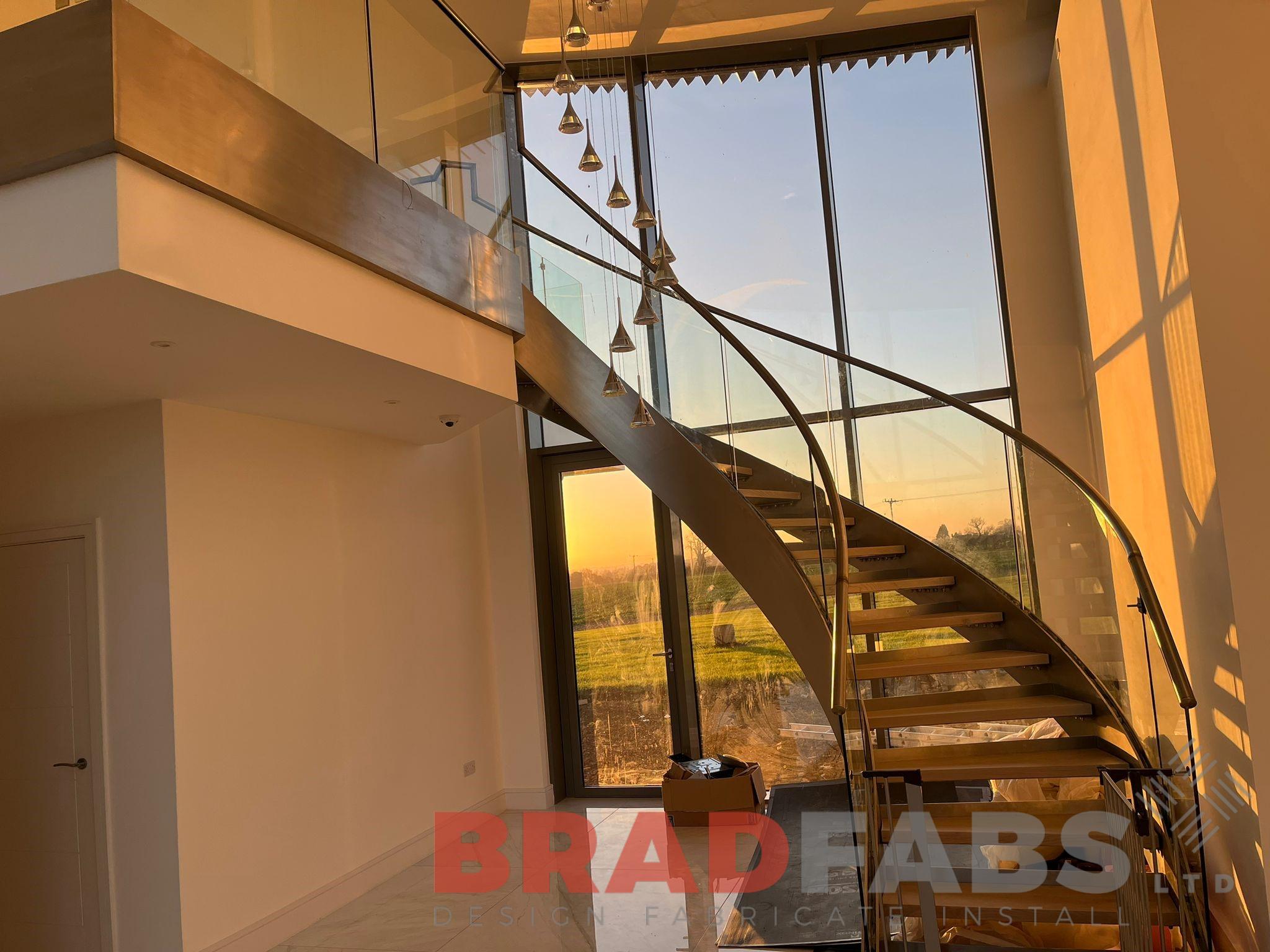 Bradfabs, indoor curved staircase with stainless steel and glass 