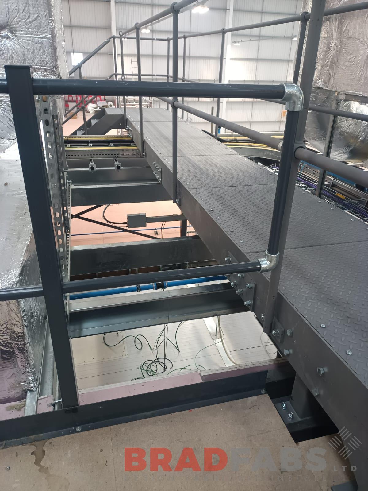 side photo of the long durbar tread steel walkway by bradfabs
