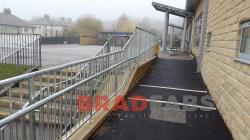 metal outdoor railings along a walkway at a school, galvanised to protect against weather by bradfabs 