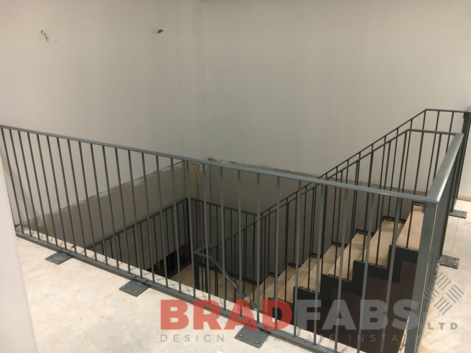 Bespoke railings for a domestic property, manufactured in mild steel and powder coated with convex flat bar handrail by Bradfabs Ltd 
