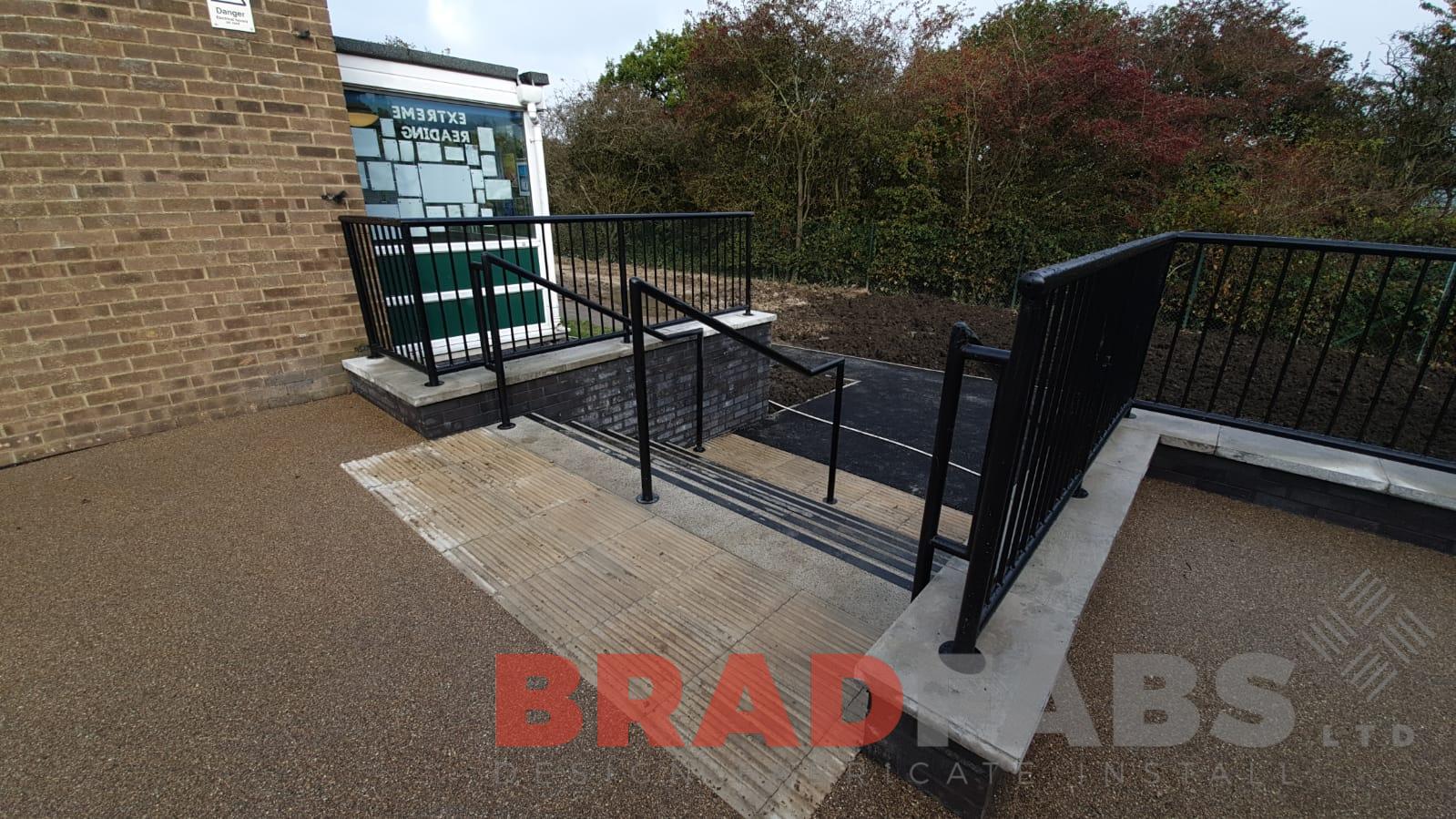Bespoke railings for a school, manufactured in mild steel, galvanised and powder coated black by Bradfabs Ltd