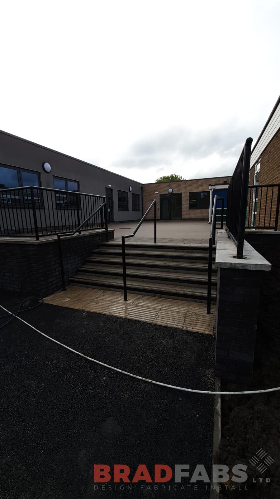 Bespoke railings and handrail by Bradfabs, a project for a school, manufactured in mild steel, galvanised and powder coated black