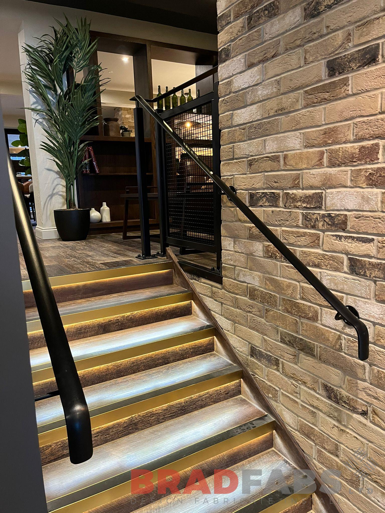 Bespoke mild steel and powder coated black handrail for a commercial project by bradfabs Ltd 