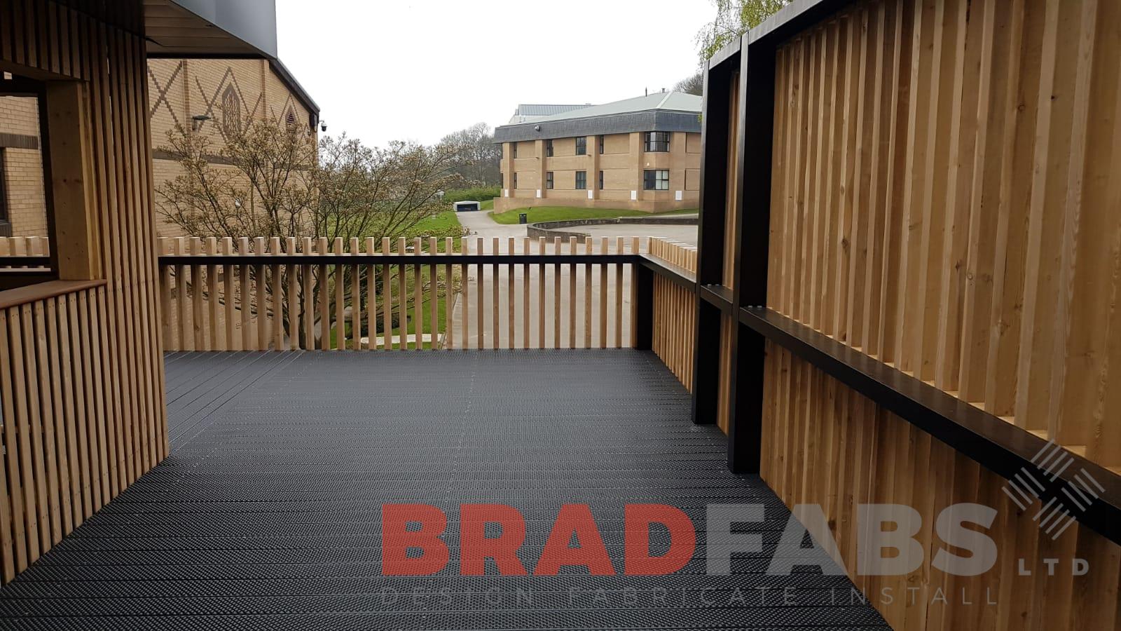 Bradfabs Ltd bespoke staircase and landing, the flooring is BNOP5 and staircase is manufactured from mild steel 