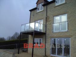 Balcony and balconette both in with stainless steel and glass