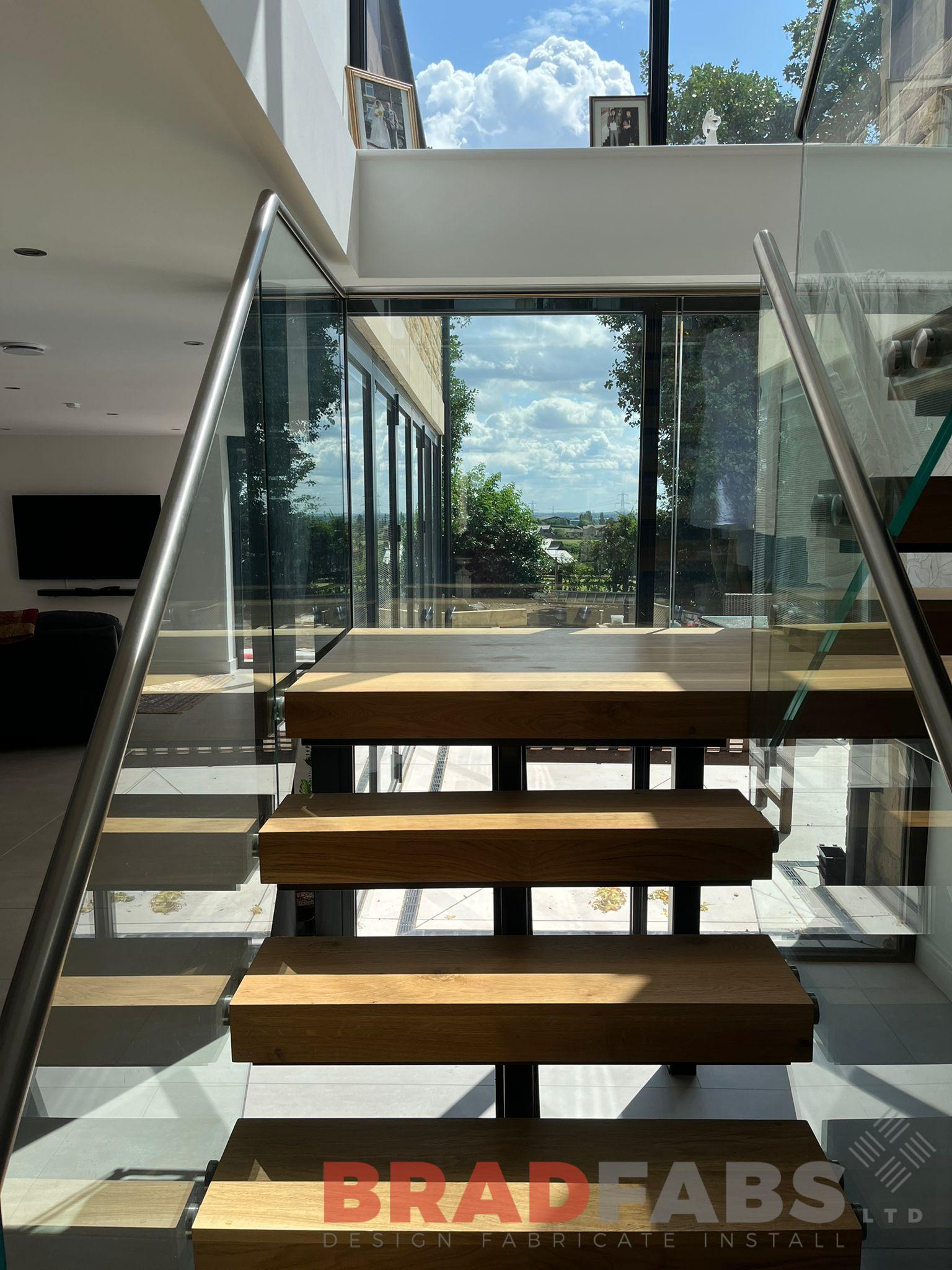 Stunning Internal Staircase with timber treads and timber top rail