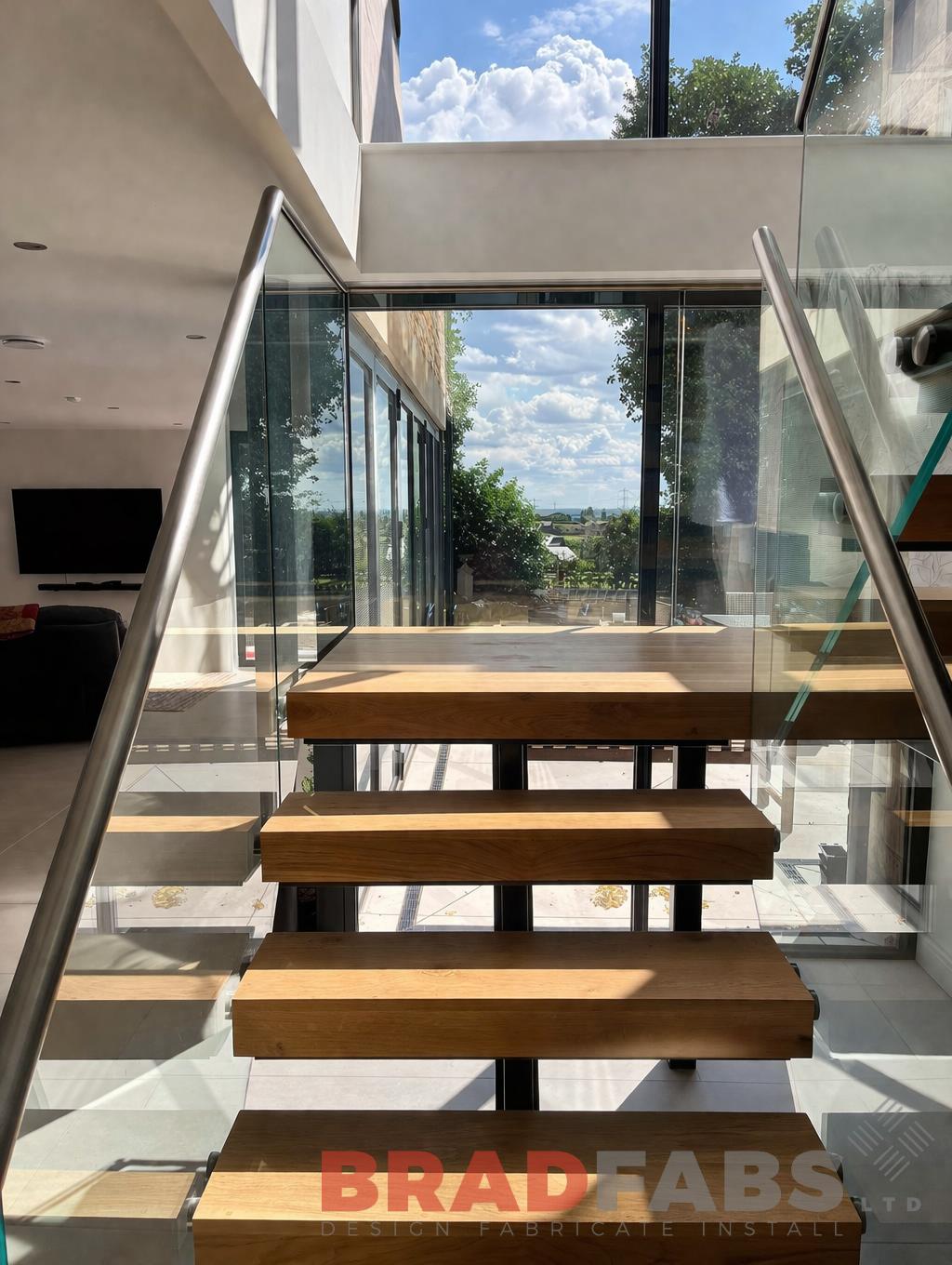 Stunning Internal Staircase with timber treads and timber top rail