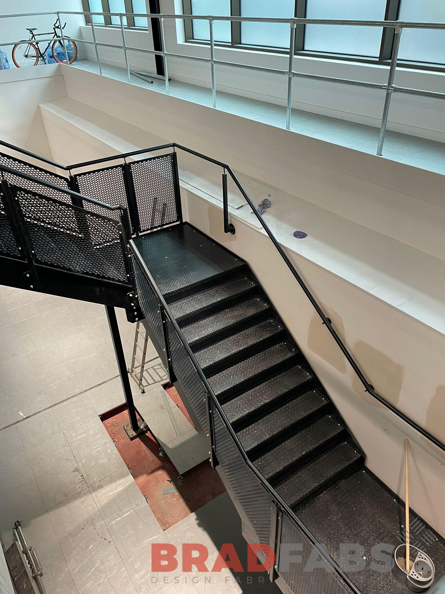 Bradfabs, internal staircase, steel staircase with mesh balustrade 