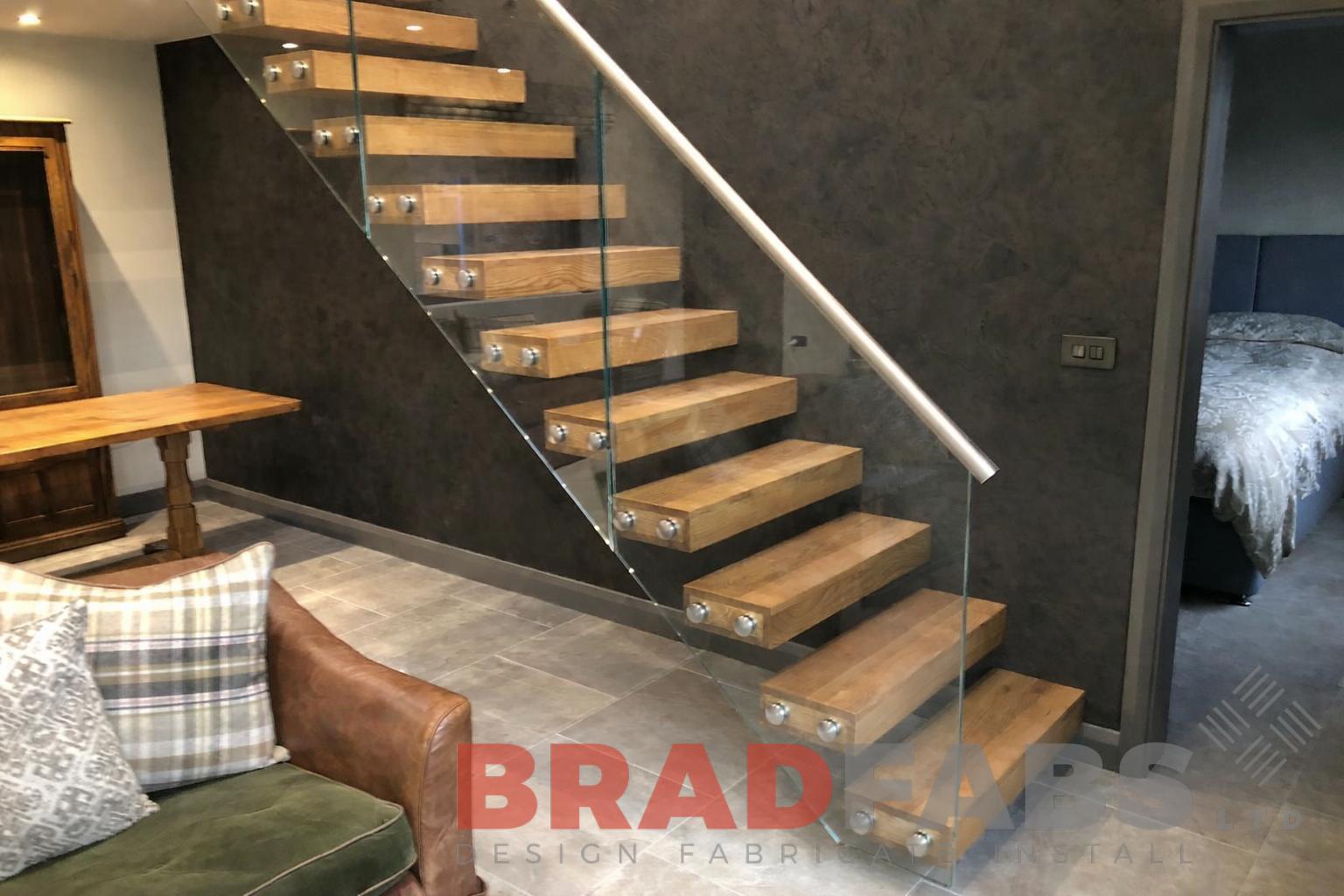 Internal floating staircase with infinity glass in Doncaster