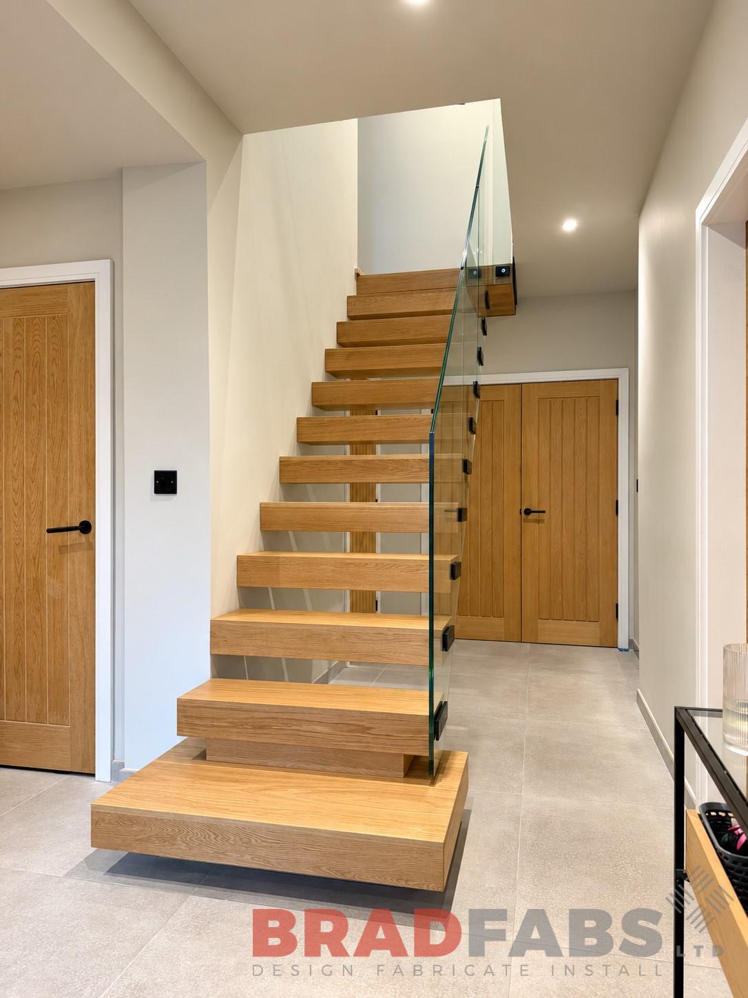 Infinity glass floating staircase installed by Bradfabs in Leicester.