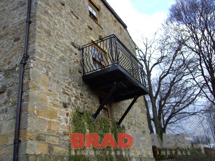 Mild steel balcony with  balustrade by Bradfabs 