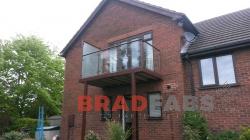 Domestic balcony with privacy glass