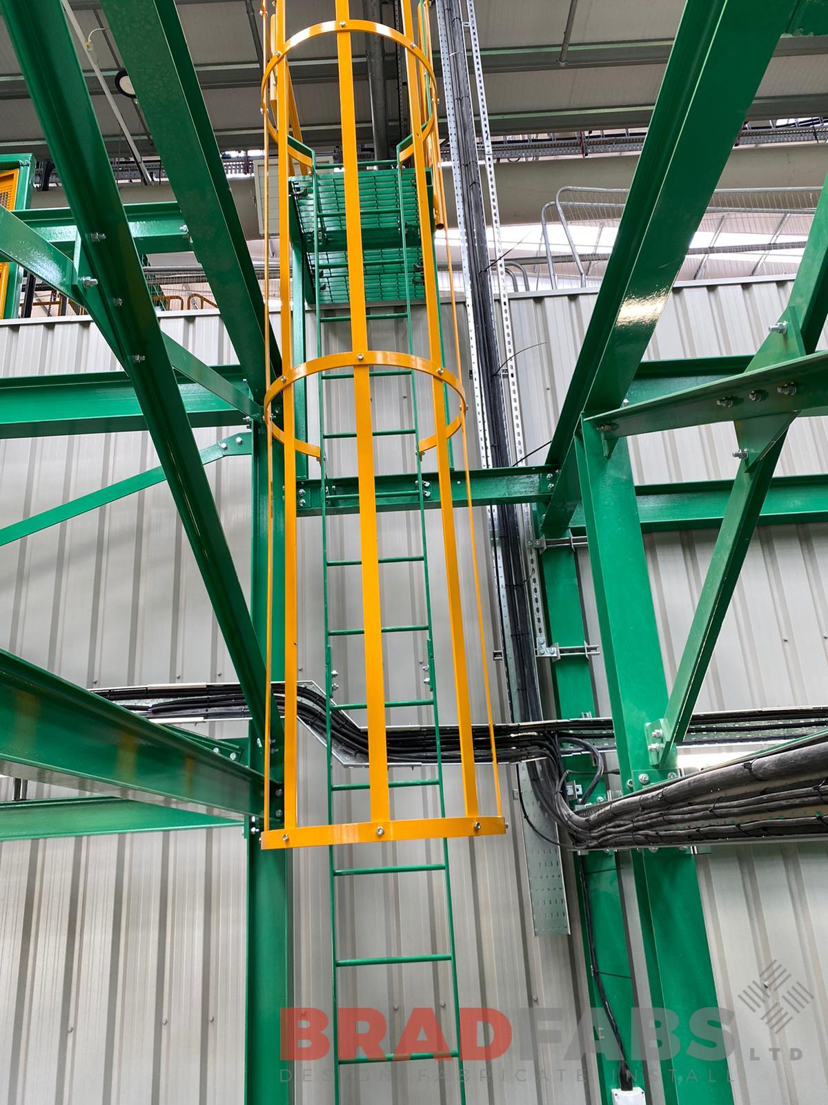 Mild steel and powder coated yellow cat ladder, for an industrial warehouse, bespoke by bradfabs 
